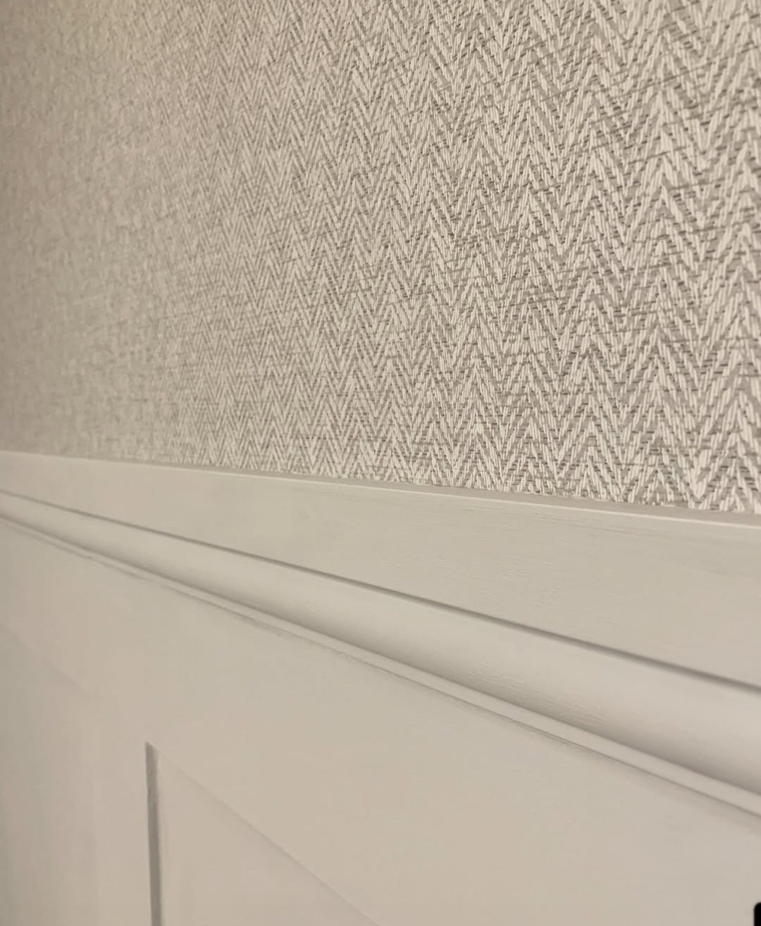 Grey wallpaper hallway