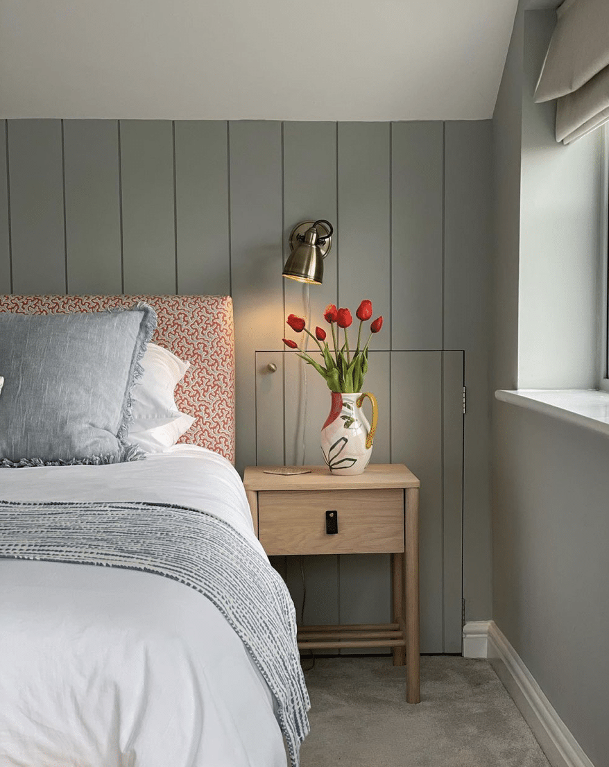 chunky tongue and groove bedroom wall panelling with affixed wall light